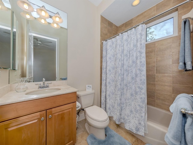 full bathroom featuring tile patterned floors, toilet, shower / bath combination with curtain, vanity, and ceiling fan