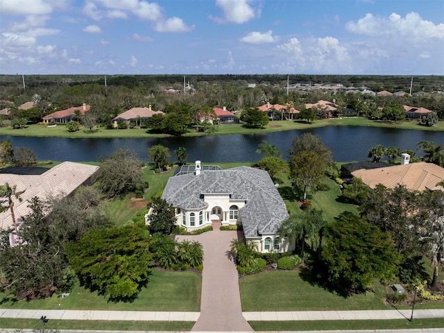 bird's eye view with a water view