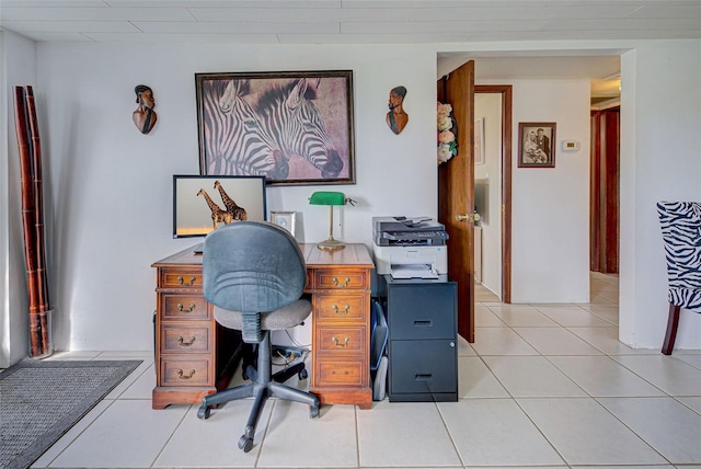 office area with light tile patterned flooring