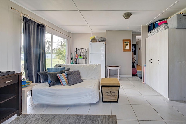 living room with light tile patterned floors