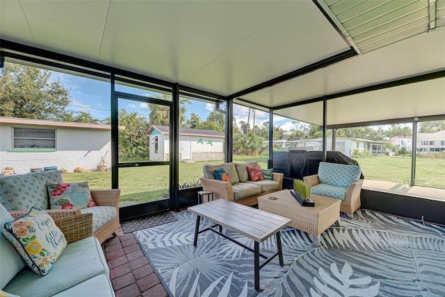 sunroom / solarium with an outdoor living space