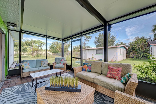 sunroom / solarium with an outdoor living space