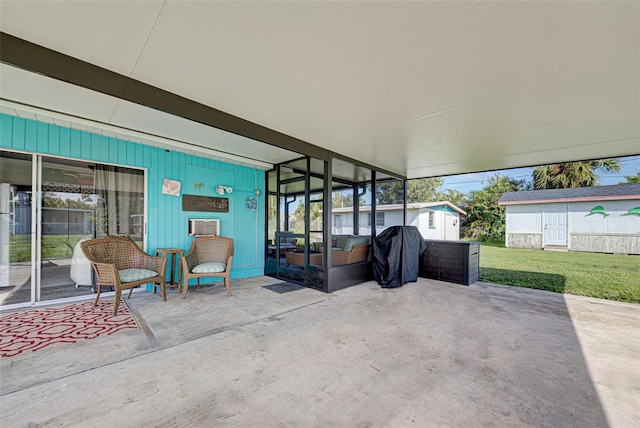 view of patio / terrace featuring a shed