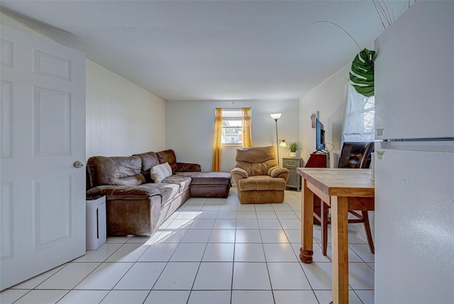living area featuring light tile patterned floors