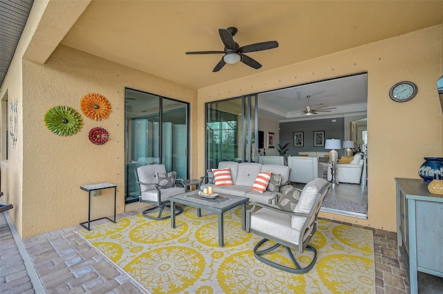 view of patio featuring ceiling fan and outdoor lounge area