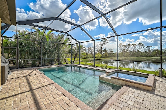 view of swimming pool featuring a water view, an in ground hot tub, a lanai, and a patio area