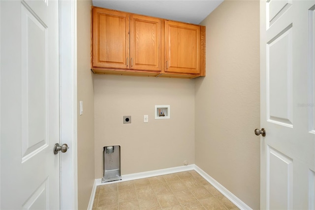 laundry area featuring hookup for a washing machine, cabinets, and hookup for an electric dryer