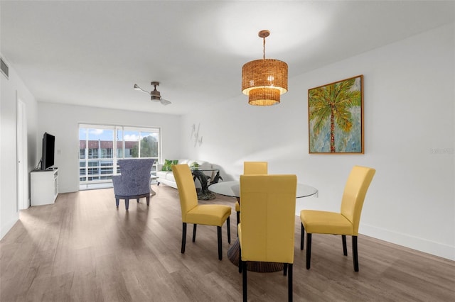 dining room featuring hardwood / wood-style flooring