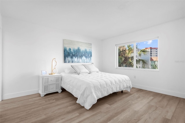 bedroom featuring light hardwood / wood-style flooring