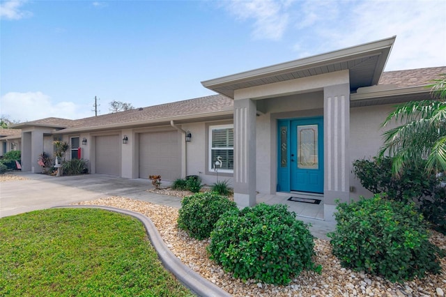 ranch-style house featuring a garage