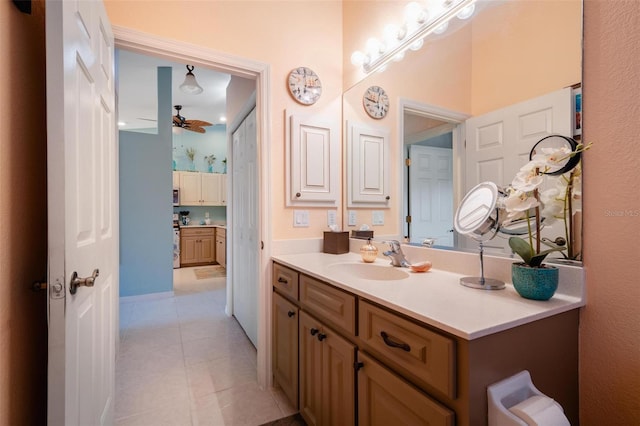 bathroom featuring vanity, ceiling fan, and tile patterned floors