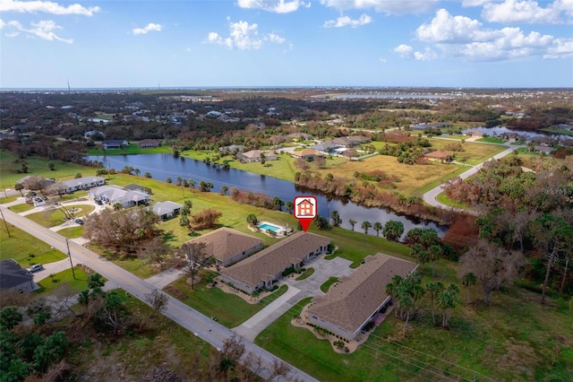 birds eye view of property featuring a water view