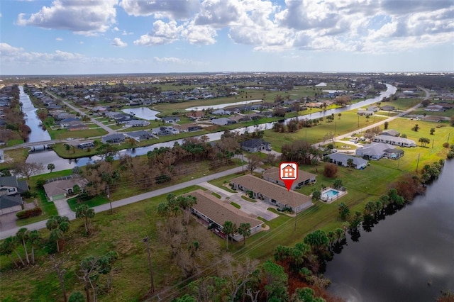 drone / aerial view featuring a water view