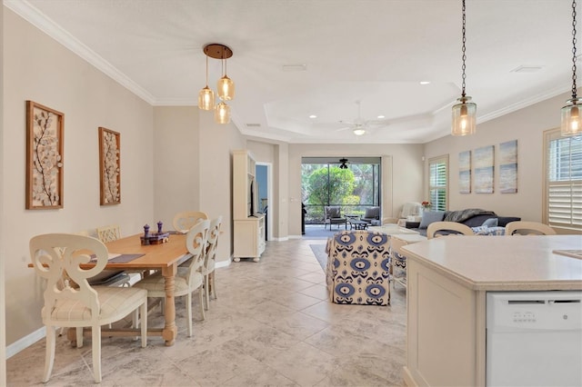 kitchen featuring dishwasher, hanging light fixtures, crown molding, and ceiling fan