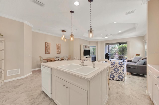 kitchen featuring sink, dishwasher, an island with sink, white cabinets, and crown molding