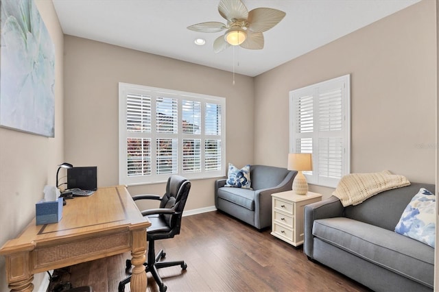 office with ceiling fan and dark hardwood / wood-style flooring