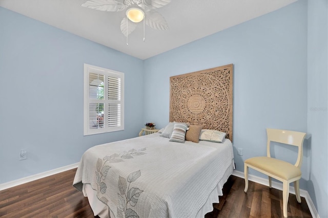 bedroom featuring ceiling fan and dark hardwood / wood-style flooring