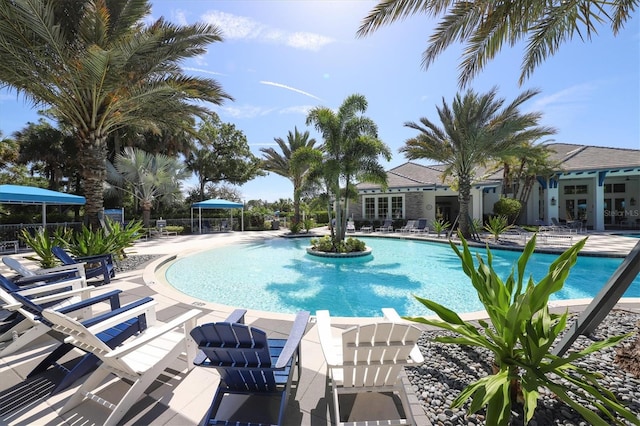 view of swimming pool featuring a patio area