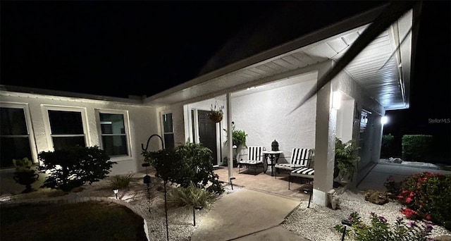 view of patio at night