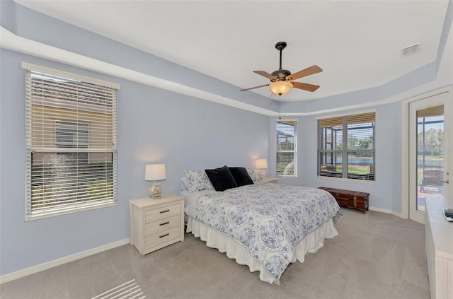 carpeted bedroom with access to exterior and ceiling fan