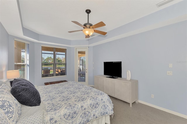 bedroom with light colored carpet and ceiling fan