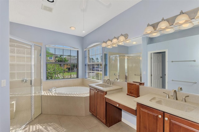 bathroom featuring vanity, separate shower and tub, and tile patterned flooring