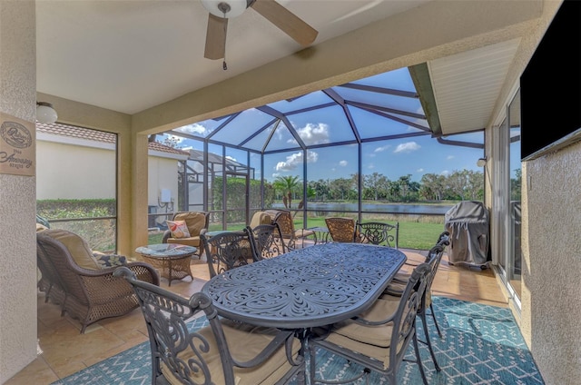 sunroom / solarium with lofted ceiling with beams and ceiling fan