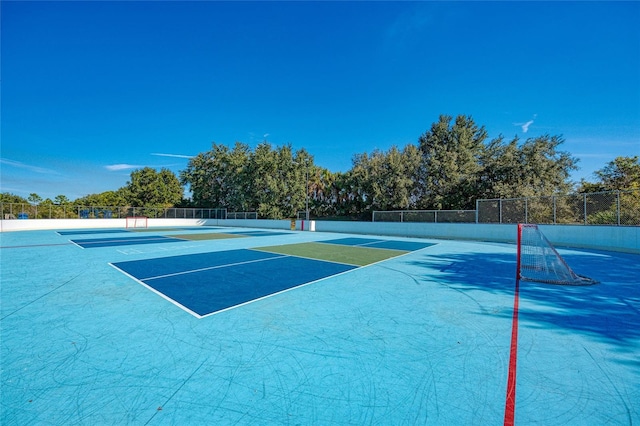 view of tennis court with basketball court