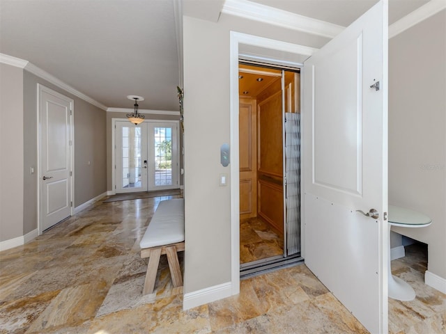 interior space with french doors and ornamental molding