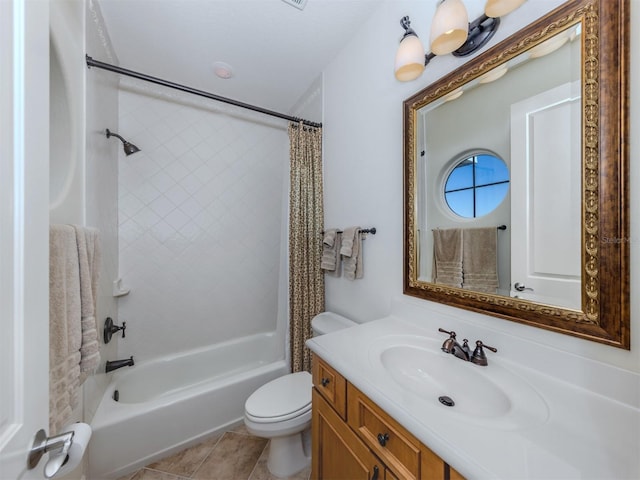 full bathroom with tile patterned flooring, shower / bath combination with curtain, vanity, and toilet