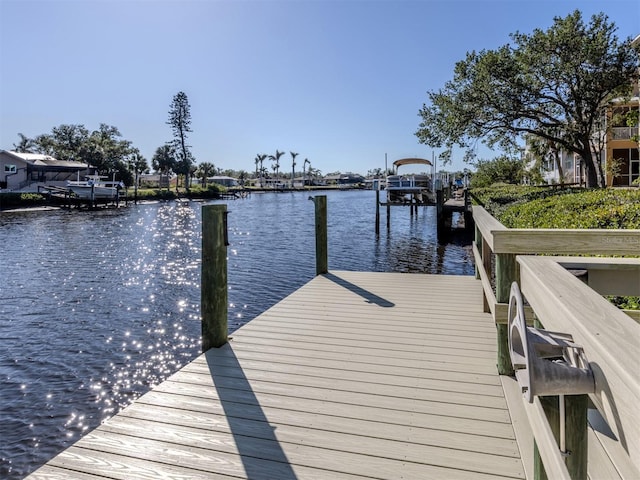 dock area featuring a water view