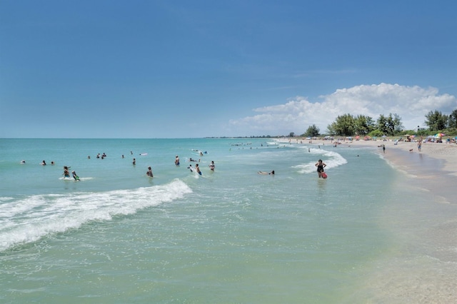 view of water feature with a beach view