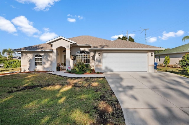 ranch-style house with a front yard and a garage