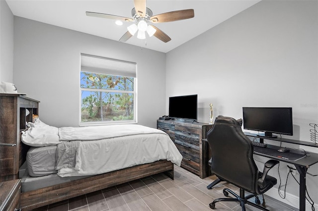 8559 Waldrep St, Port Charlotte, FL 33981 - bedroom featuring a desk, wood finished floors, and a ceiling fan