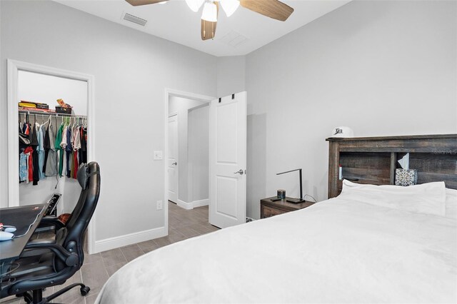 8559 Waldrep St, Port Charlotte, FL 33981 - bedroom featuring wood finished floors, baseboards, a closet, a spacious closet, and a ceiling fan