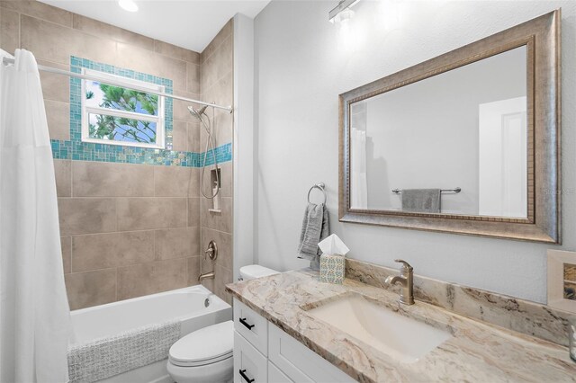 8559 Waldrep St, Port Charlotte, FL 33981 - full bath with toilet, vanity, and shower / bath combo with shower curtain