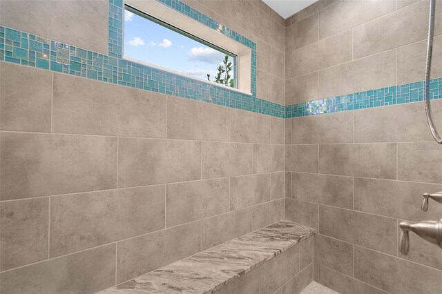 8559 Waldrep St, Port Charlotte, FL 33981 - full bathroom featuring tiled shower