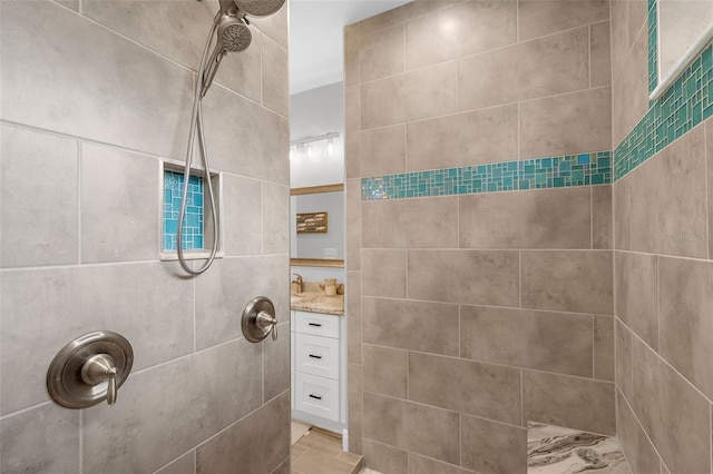 8559 Waldrep St, Port Charlotte, FL 33981 - bathroom featuring a tile shower and vanity