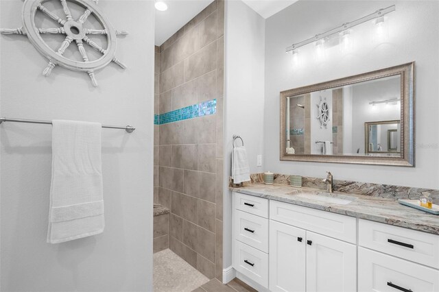 8559 Waldrep St, Port Charlotte, FL 33981 - bathroom featuring walk in shower and vanity