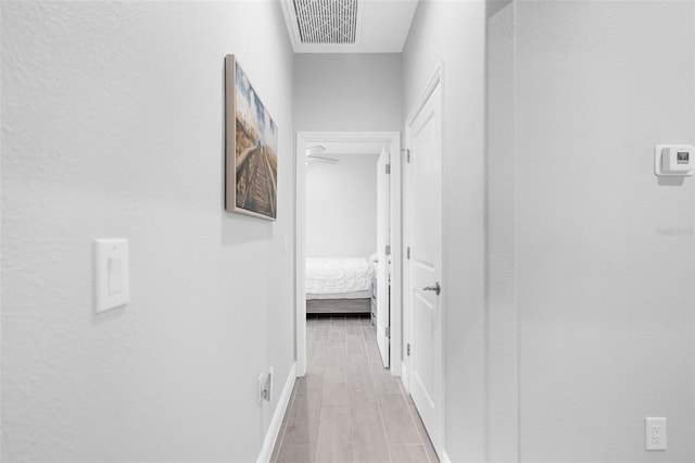 hallway featuring light hardwood / wood-style floors