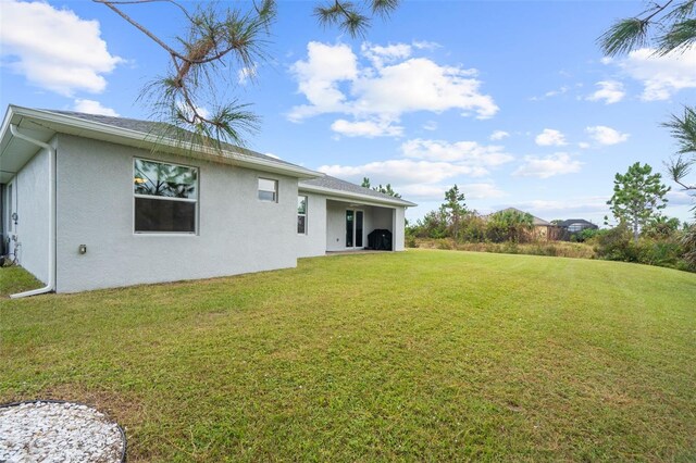8559 Waldrep St, Port Charlotte, FL 33981 - view of grassy yard