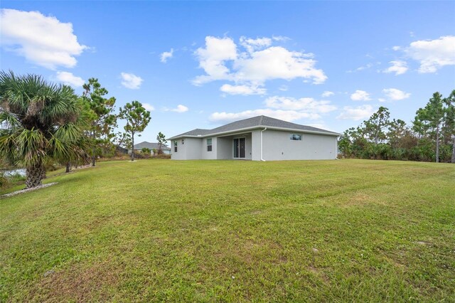 8559 Waldrep St, Port Charlotte, FL 33981 - view of green lawn
