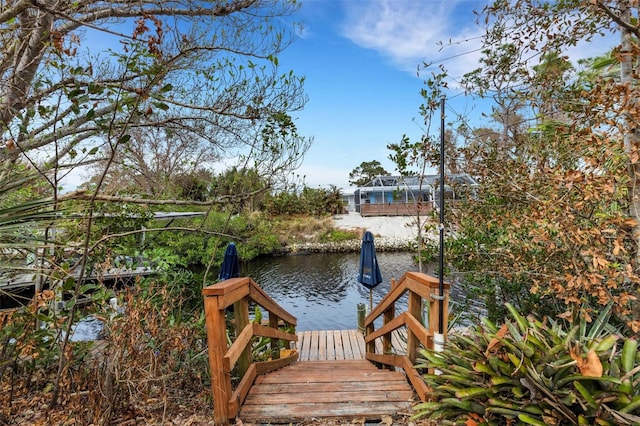 view of dock with a water view