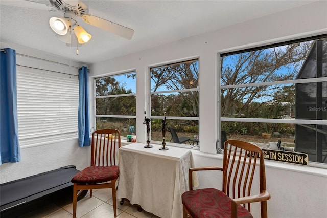 sunroom / solarium with ceiling fan