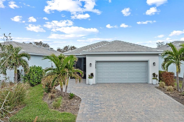 single story home featuring a garage