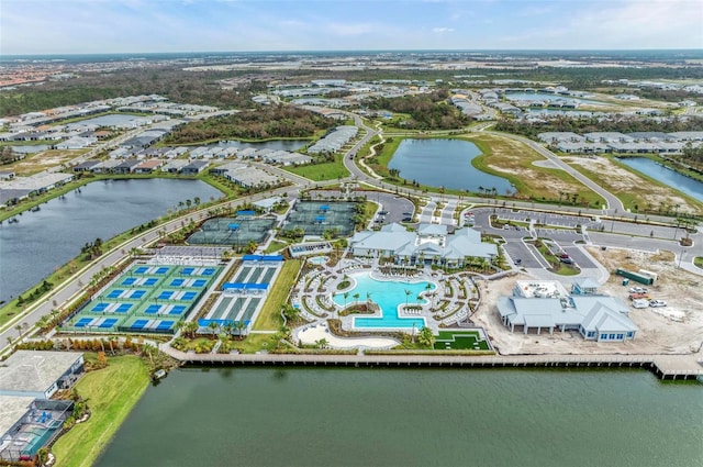 birds eye view of property featuring a water view