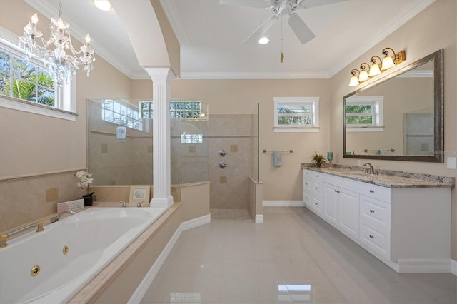 bathroom with vanity, decorative columns, shower with separate bathtub, and plenty of natural light