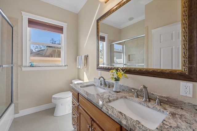 full bathroom with vanity, crown molding, toilet, and plenty of natural light