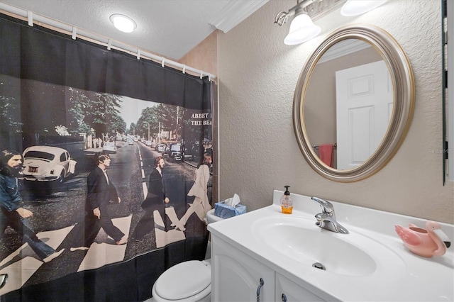 bathroom featuring toilet, crown molding, curtained shower, and vanity