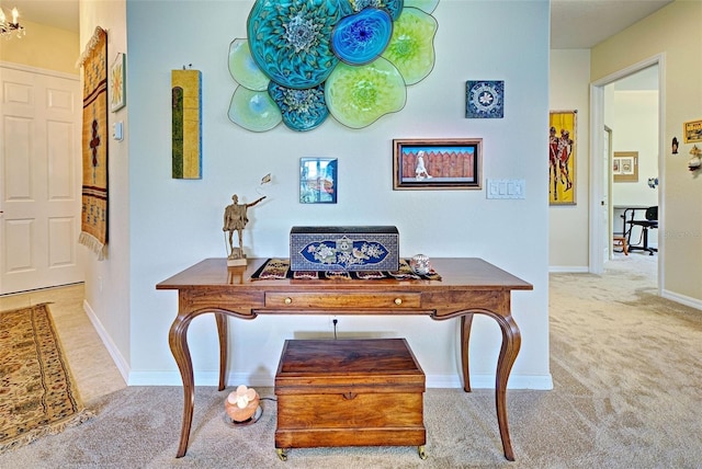 1704 Triano Cir Unit 1704, Venice, FL 34292 - carpeted office space with baseboards and a chandelier